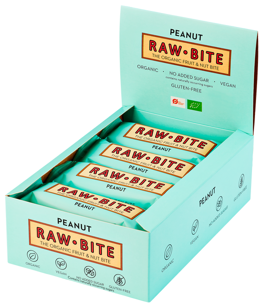 Op deze afbeelding staat een doos met RAWBITE pinda eiwitrepen. Deze doos bevat 12 repen van 50 gram per reep.